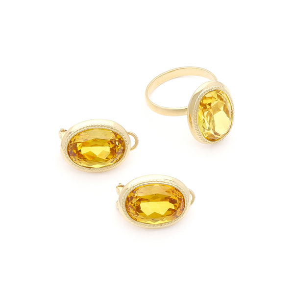 Juego anillo y aretes estriados con citrinos en oro amarillo 14 kilates.