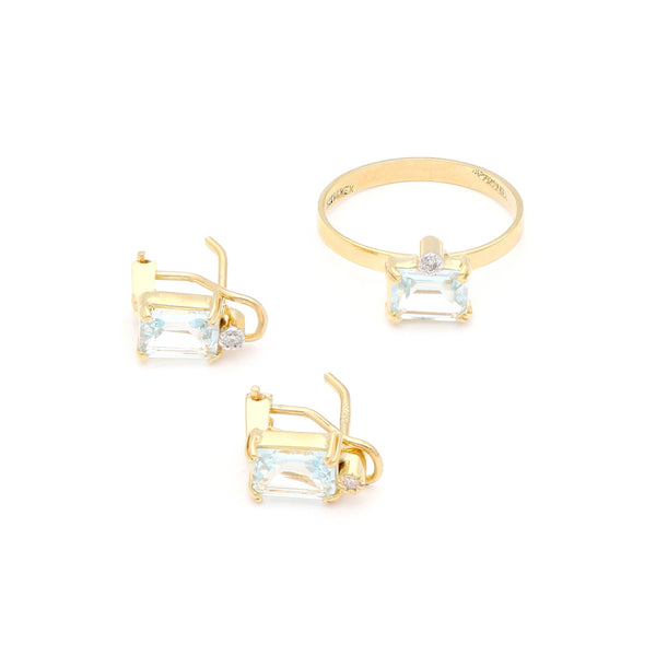 Juego anillo y aretes diseño especial con diamantes y topacios en oro amarillo 14 kilates.
