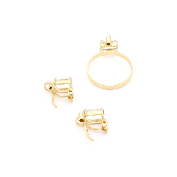 Juego anillo y aretes diseño especial con diamantes y topacios en oro amarillo 14 kilates.