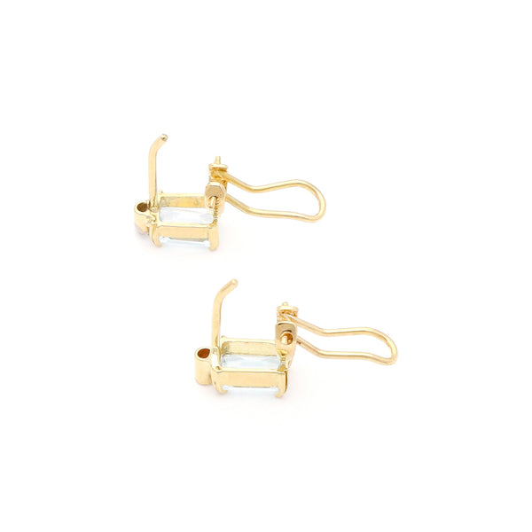 Juego anillo y aretes diseño especial con diamantes y topacios en oro amarillo 14 kilates.