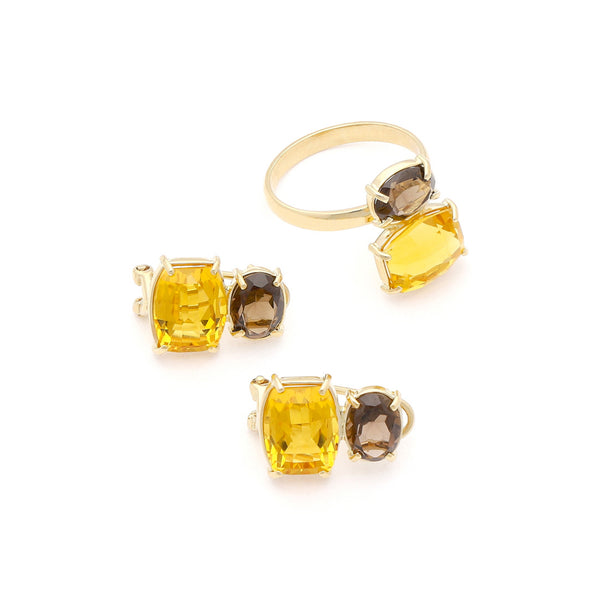 Juego de anillo y aretes diseño especial con citrinas y topacios en oro amarillo 14 kilates.