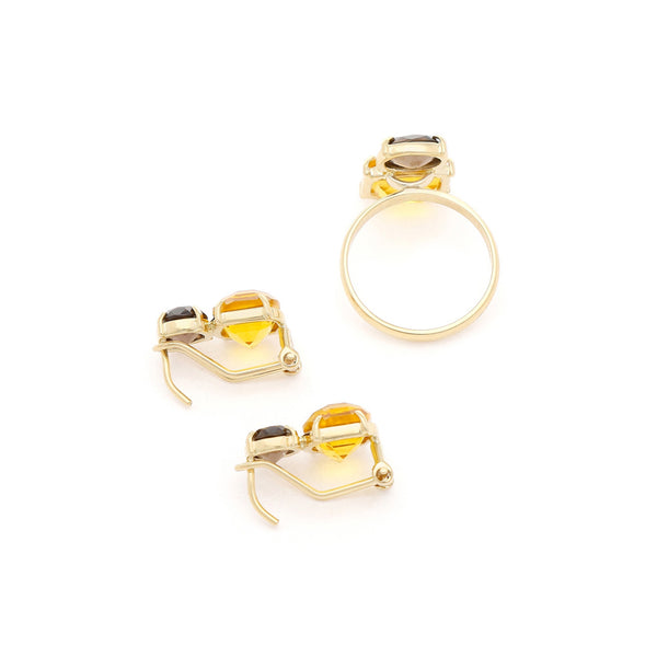 Juego de anillo y aretes diseño especial con citrinas y topacios en oro amarillo 14 kilates.