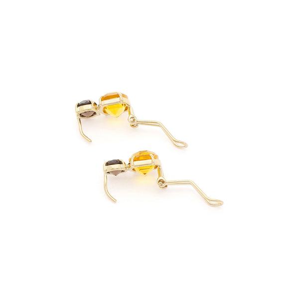Juego de anillo y aretes diseño especial con citrinas y topacios en oro amarillo 14 kilates.