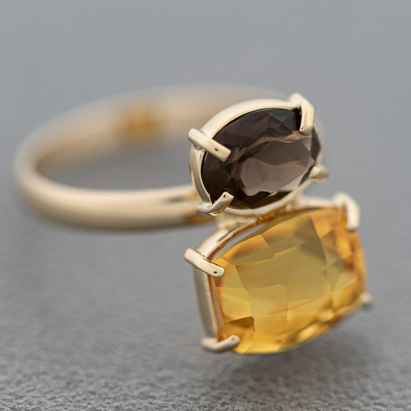Juego de anillo y aretes diseño especial con citrinas y topacios en oro amarillo 14 kilates.
