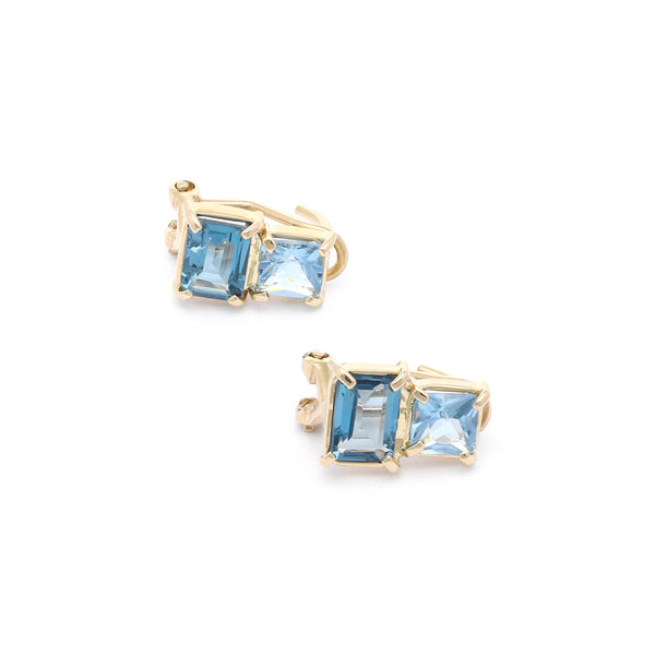 Aretes diseño especial con aguamarina y topacio en oro amarillo 14 kilates.