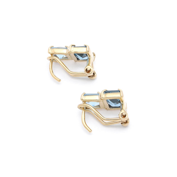 Aretes diseño especial con aguamarina y topacio en oro amarillo 14 kilates.