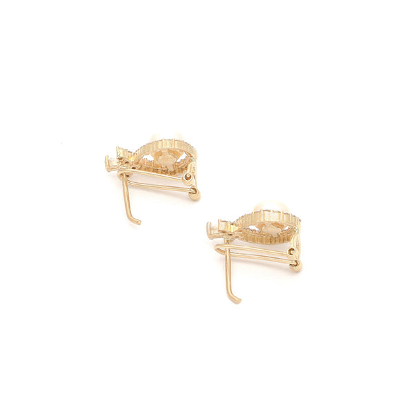 Aretes diseño especial con perlas y circonias en oro amarillo 14 kilates.