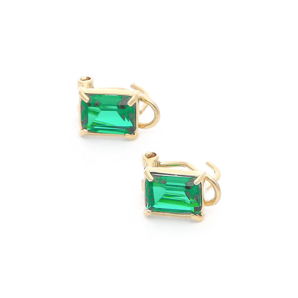 Aretes diseño especial con cuarzo en oro amarillo 14 kilates.