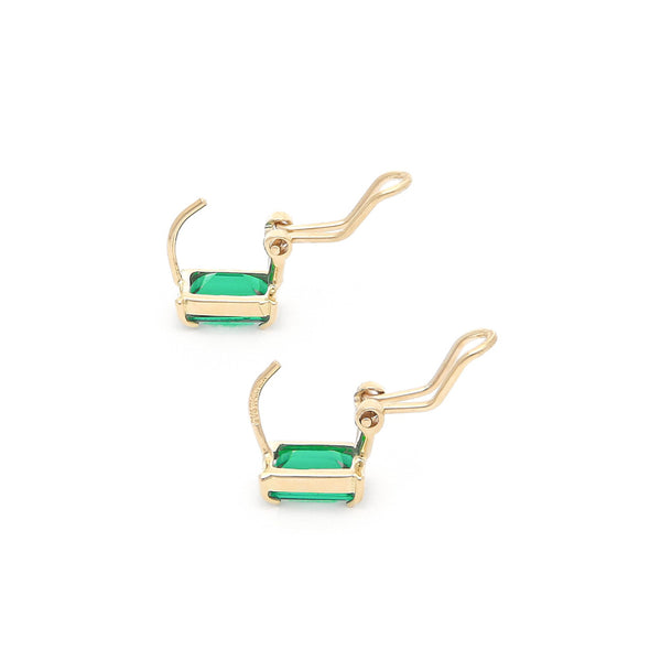 Aretes diseño especial con cuarzo en oro amarillo 14 kilates.