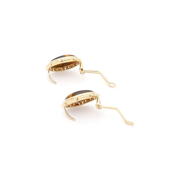 Aretes calados con ojo de tigre en oro amarillo 14 kilates.