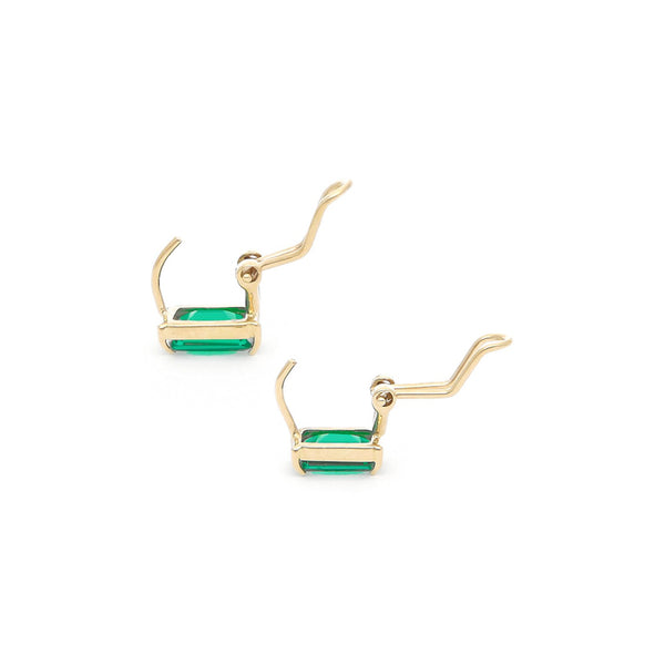 Juego anillo y aretes diseño especial con obsidianas en oro amarillo 14 kilates.