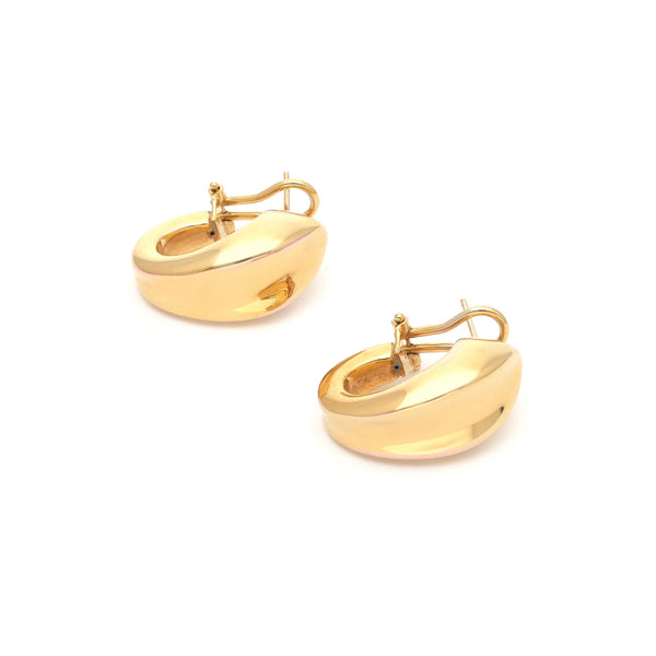 Aretes huecos en oro amarillo 14 kilates.