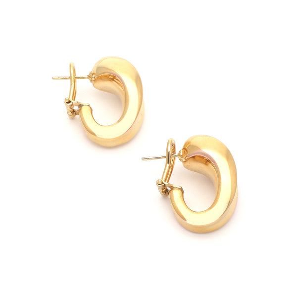 Aretes huecos en oro amarillo 14 kilates.
