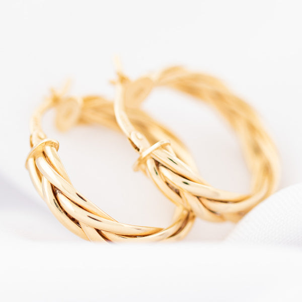 Arracadas torzal en oro amarillo 14 kilates.