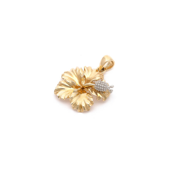 Dije diseño especial motivo flor en oro dos tonos 14 kilates.