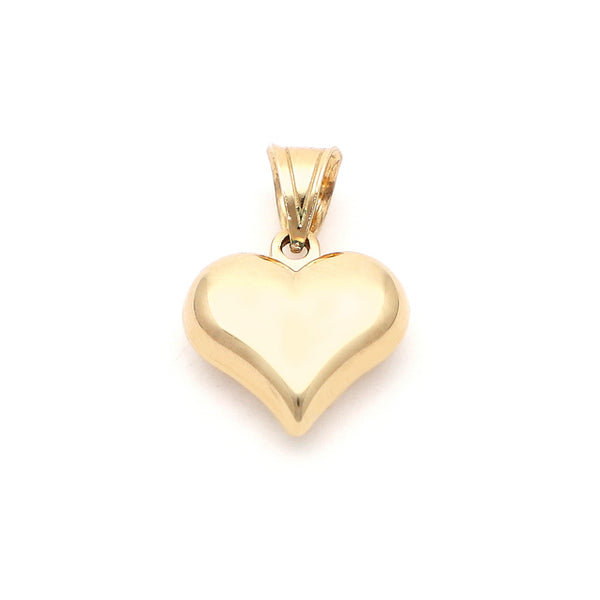 Dije hueco motivo corazón en oro amarillo 14 kilates.