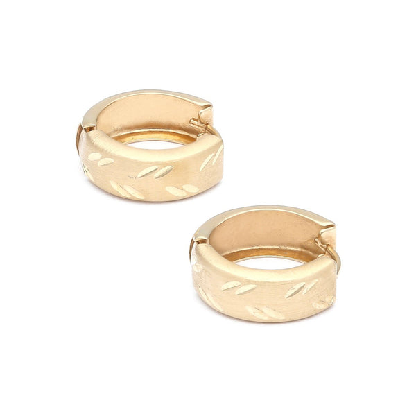 Arracadas articuladas en oro amarillo 14 kilates.