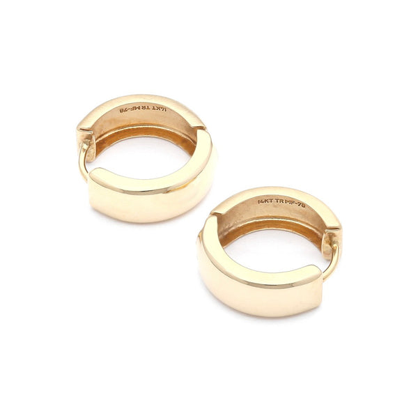 Arracadas articuladas en oro amarillo 14 kilates.