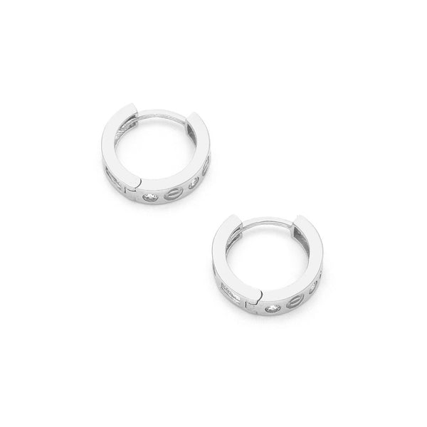 Arracadas diseño especial con circonias en oro blanco 14 kilates.