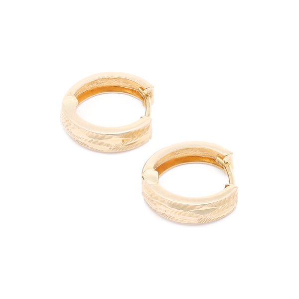Arracadas articuladas en oro amarillo 14 kilates.