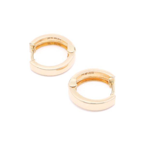 Arracadas articuladas en oro amarillo 14 kilates.