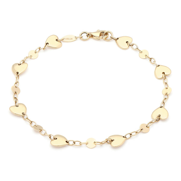 Pulsera eslabón cruzado con aplicaciones de corazón en oro amarillo 14 kilates.