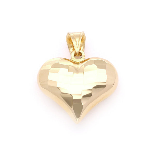 Dije facetado motivo corazón en oro amarillo 14 kilates.