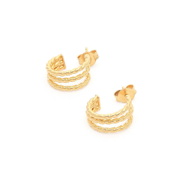 Aretes trenzados en oro amarillo 14 kilates.