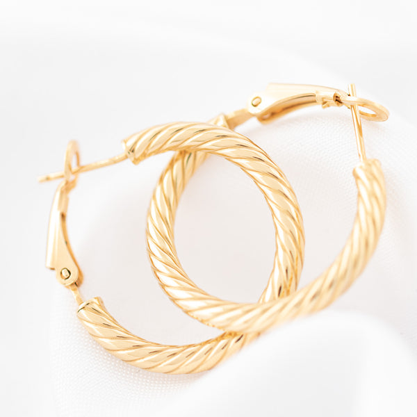 Arracadas torzal en oro amarillo 14 kilates.