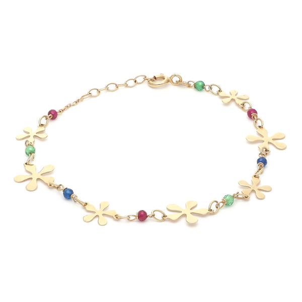 Pulsera eslabón combinado con aplicaciones motivo flor y sintéticos en oro amarillo 14 kilates.