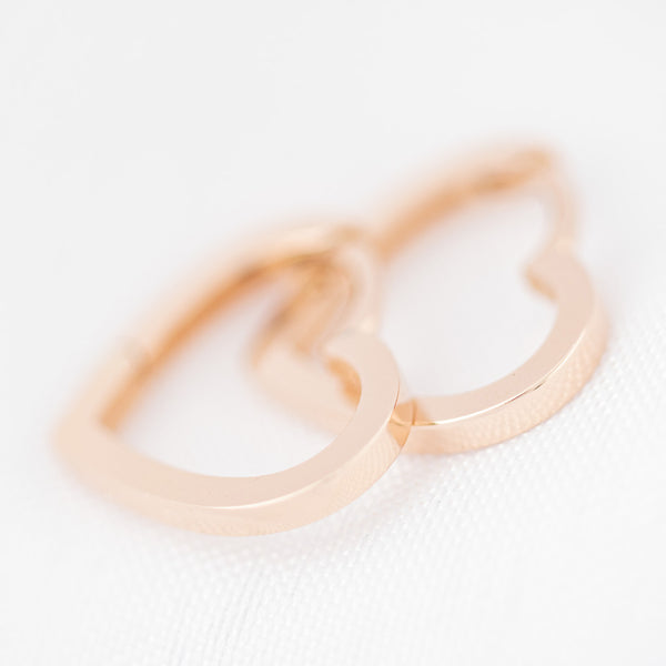 Arracadas articuladas motivo corazón en oro rosa 14 kilates.
