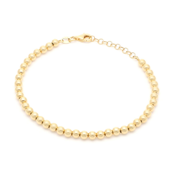 Pulsera eslabón boleado en oro amarillo 14 kilates.