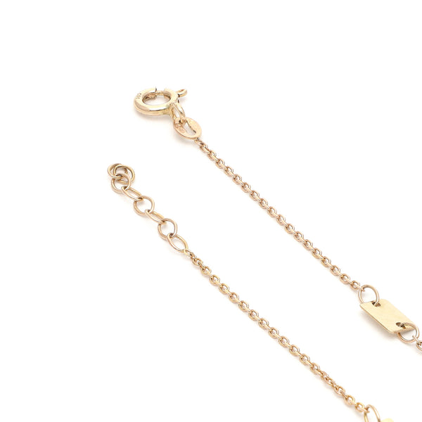 Pulsera eslabón cruzado con aplicaciones motivo rectángulo en oro amarillo 14 kilates.