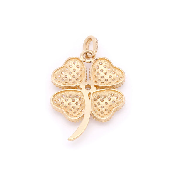 Dije diseño especial con circonias motivo trébol en oro amarillo 14 kilates.