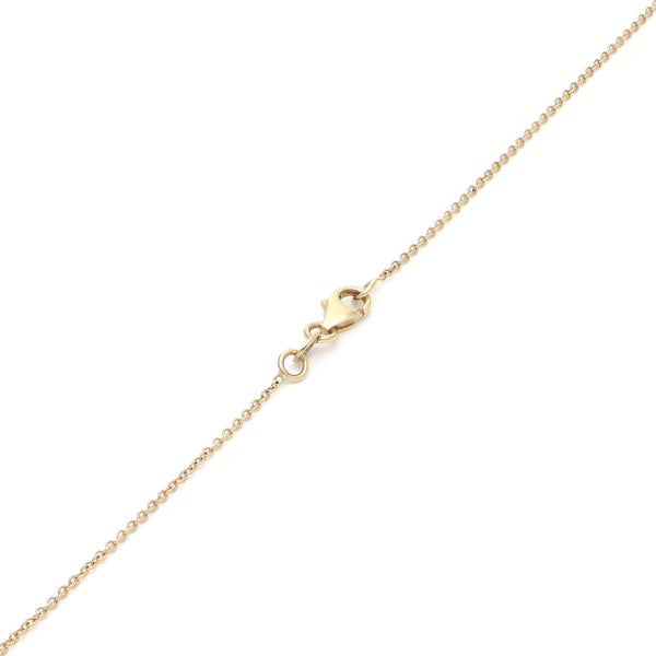 Juego de gargantilla eslabón cruzado con dije y aretes diseño especial con sintéticos en oro amarillo 14 kilates.