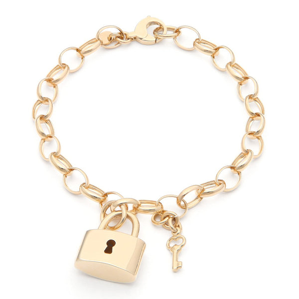Pulsera eslabón cruzado con colgantes motivo candado y llave en oro amarillo 14 kilates.