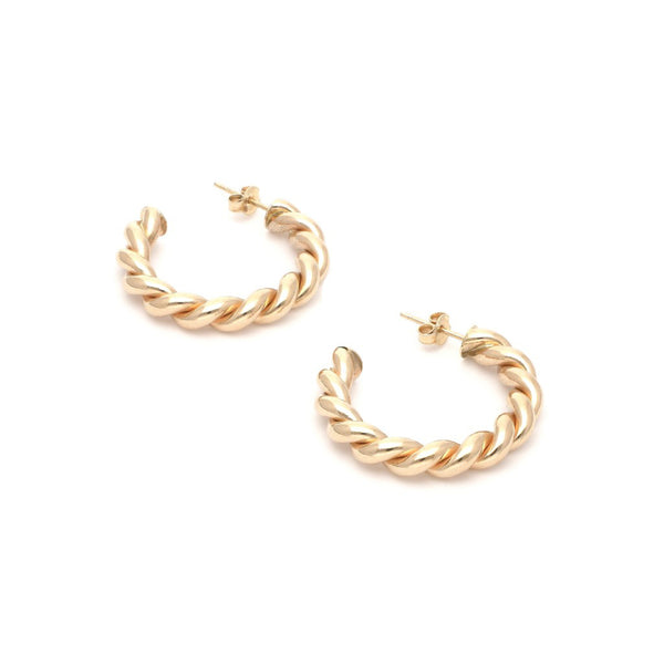 Aretes torzales en oro amarillo 14 kilates.