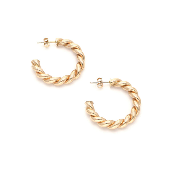 Aretes torzales en oro amarillo 14 kilates.