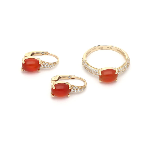 Juego de anillo y aretes diseño especial con sintéticos en oro amarillo 14 kilates.