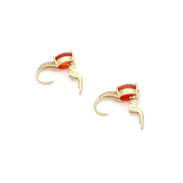 Juego de anillo y aretes diseño especial con sintéticos en oro amarillo 14 kilates.