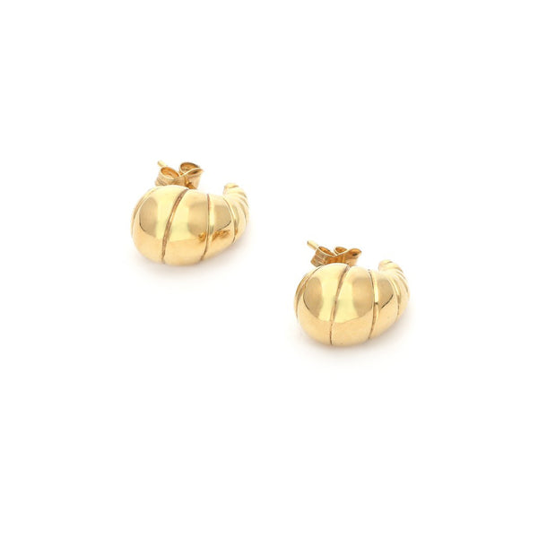 Aretes huecos motivo gota en oro amarillo 14 kilates.