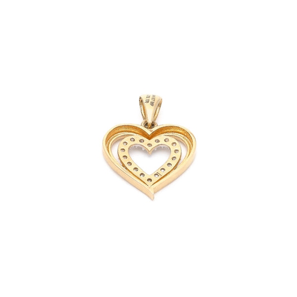 Dije diseño especial con circonias motivo corazón en oro amarillo 14 kilates.