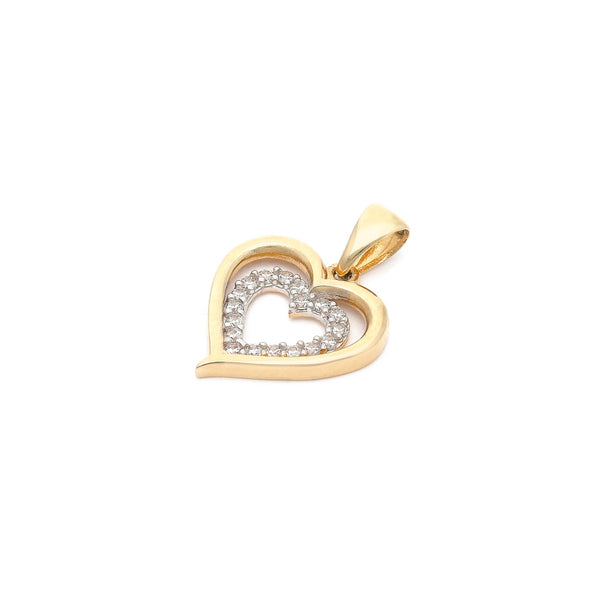 Dije diseño especial con circonias motivo corazón en oro amarillo 14 kilates.