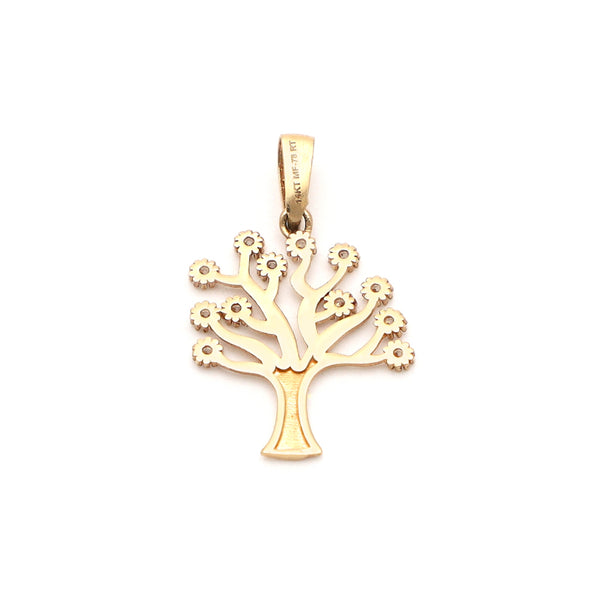 Dije diseño especial con circonias motivo árbol en oro amarillo 14 kilates.