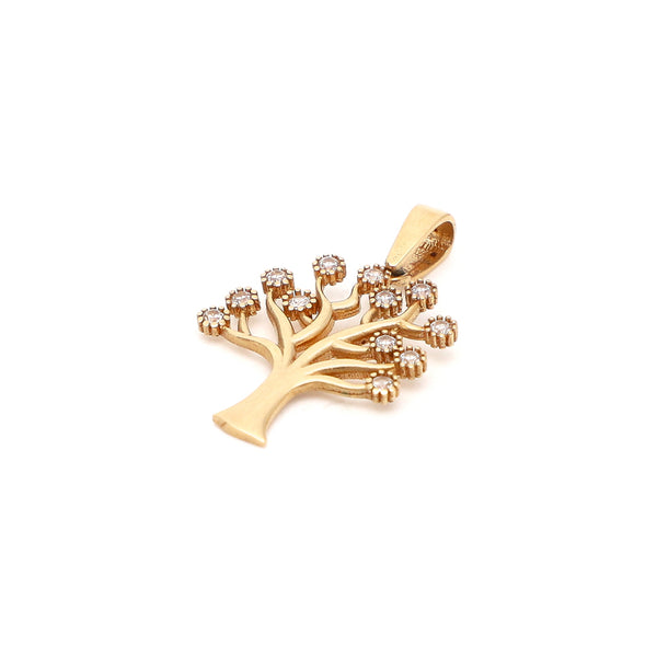 Dije diseño especial con circonias motivo árbol en oro amarillo 14 kilates.