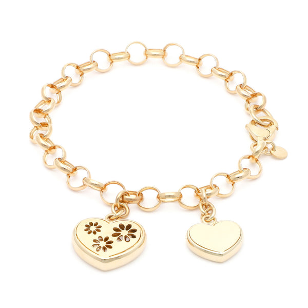 Pulsera eslabón cruzado con colgantes motivo corazón en oro amarillo 14 kilates.
