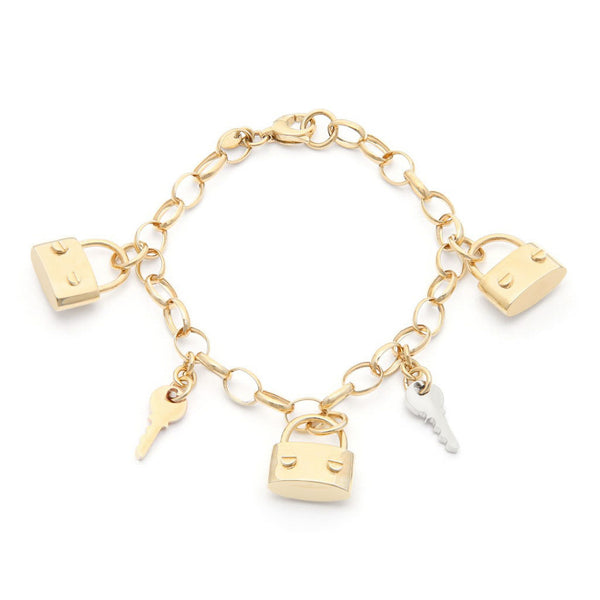 Pulsera eslabón cruzado colgantes motivo llave y candado en oro amarillo 14 kilates.