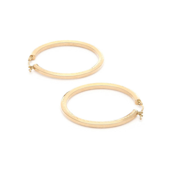 Arracadas martilladas en oro amarillo 14 kilates.