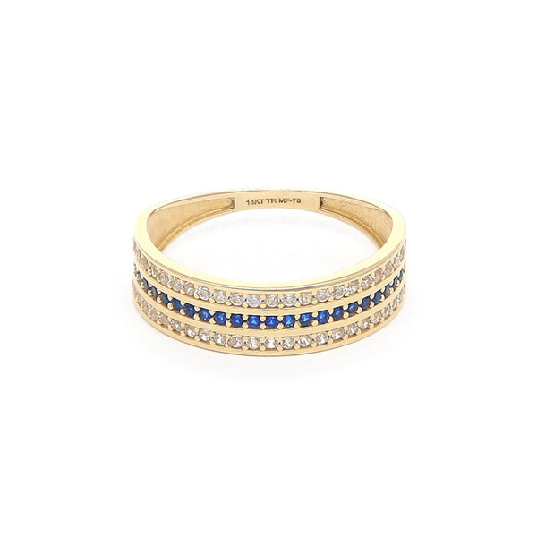Anillo diseño especial con sintéticos en oro amarillo 14 kilates.