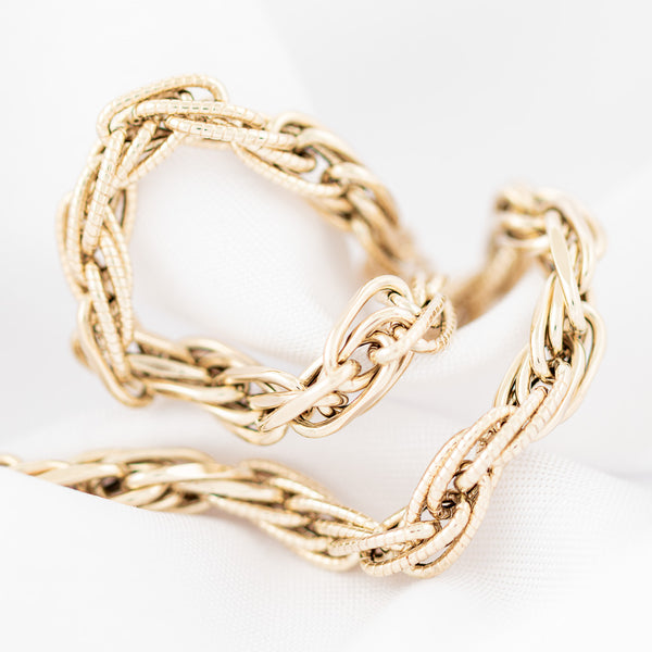 Pulsera eslabón torzal en oro amarillo 14 kilates.